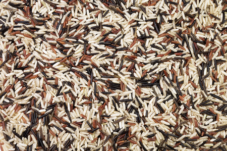 Food background with of rice variety . rice mixture. brown rice, black rice, white rice.の写真素材