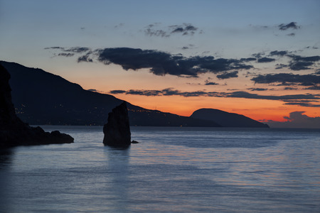 Dawn in the Crimea near the Swallow's Nest with rock "Sail" in the foreground, Russiaの写真素材