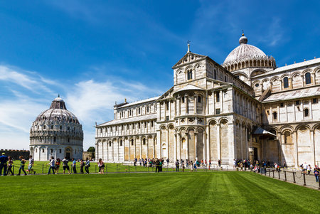 PISA, ITALY - MAY 10, 2014: Cathedral St. Mary of the Assumption and Baptistery of St. John in the Piazza dei Miracoli in Pisa, Italyのeditorial素材