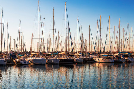 ASHDOD, ISRAEL - JANUARY 08, 2015: Marina with docked yachts at sunsetのeditorial素材