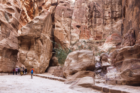 The road between the red cliffs to the ancient city of Petra, Jordanの写真素材