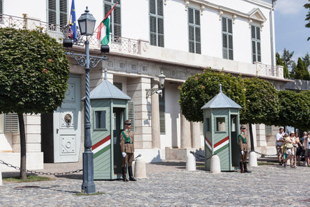 BUDAPEST, HUNGARY - AUGUST 18, 2012: The honor guard near  the Alexander Palace - the place of work of the President. Hungaryのeditorial素材