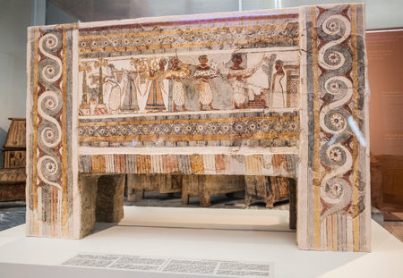 The clay sarcophagus from Agia Triada - the settlements of the Minoan civilization era, with the burial rites - "The Feast of the Dead" in the Archaeological Museum in Heraklion, Crete, Greeceのeditorial素材