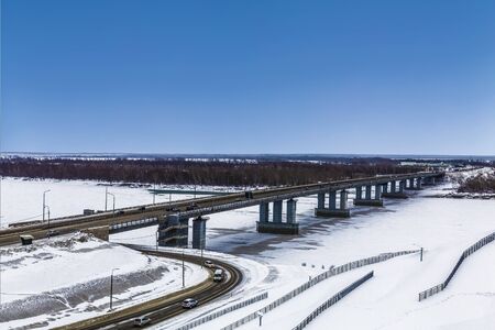 Automobile bridge over the Ob river in Barnaul in winter. Altai territory, Russiaの写真素材