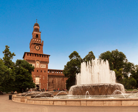 View of the Sforza castle in Milan with a fountain in the foreground in the Castle square in the historical center. Italyのeditorial素材