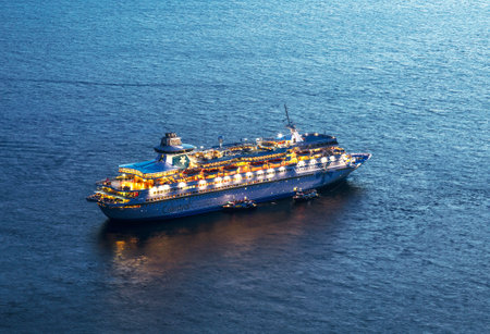 Cruise ship Celestyal Cruises a Cypriot tourist company parked near the Greek island of Santorini at...