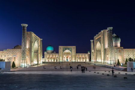 View of Registan square in Samarkand with Ulugbek madrassas, Sherdor madrassas and Tillya-Kari madrassas at night with  backlight. Uzbekistanのeditorial素材