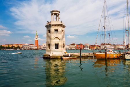 View of the Piazza San Marco, the lighthouse at the island of San Giorgio Maggiore and the yachts at the pier. Venice, Italyのeditorial素材