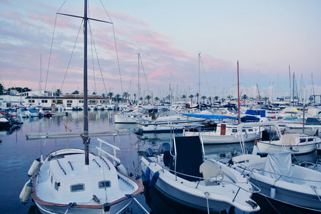 The picturesque coast of Spain with yachts in the seaの写真素材