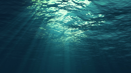 3D rendering of rays of sunlight shining from above, penetrating deep clear blue water, resulting in a beautiful water curtain reflecting lightの写真素材