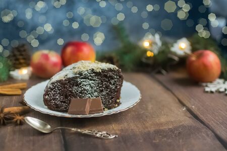 Christmas healthy paleo style brownie cake made from cocoa and coconut oil, gluten free. Dessert without milk.Helpful holiday baking on wooden rustic Christmas background. vegan diet.Selective focusの写真素材