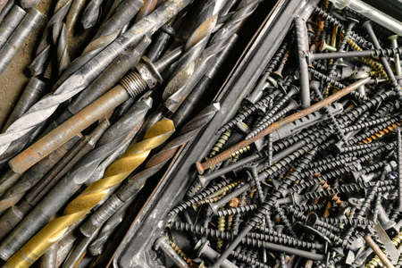 A set of metal tools in the workshop on an old rustic wooden background.concept.Fathers day or labor...