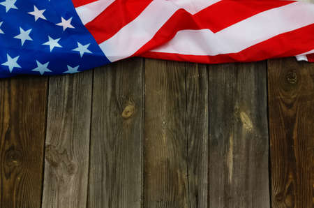 American Flag close up on wood background for Memorial Day or 4th of July. Flag Day. National...