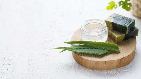 Eco-friendly cosmetic products for skin care of the face, body. Natural creams, soap, oils and other cosmetic products with minerals, aloe, vitamins and prebiotics for health on white background.の写真素材