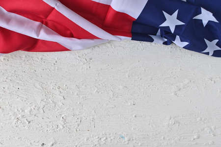 American Flag close up on white background for Memorial Day or 4th of July. flag day. national patriotic holiday. Greeting card or banner for a website or store sale. Layout. top view.の写真素材