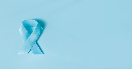 World Diabetes day. Blue ribbon on blue background is a symbol of diabetes awareness. November 14th....