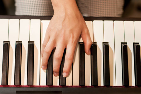 The girl plays the pianoの写真素材