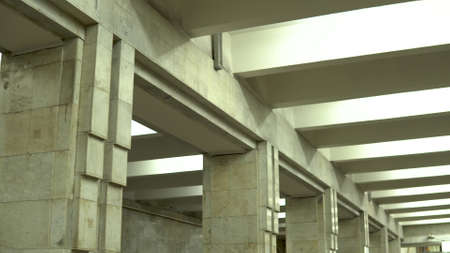 Old marble subway corridor with large columnsの写真素材