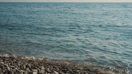 View of the clear turquoise sea. High tide on the Black Sea.の写真素材
