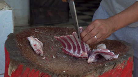 man chopping  meat background.
