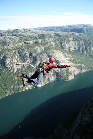 Jump off a cliff with a rope.