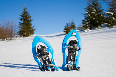 Snowshoeing. Snowshoes in the snow.の写真素材