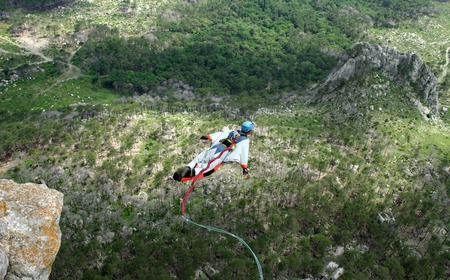 Jump off a cliff with a rope.