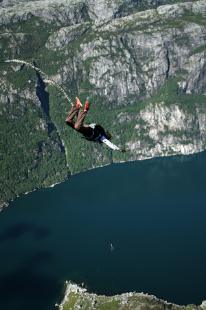 Jump with a rope into the canyon.の写真素材