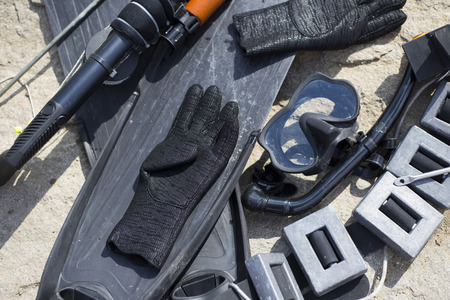 Underwater hunter dives into the sea.の写真素材