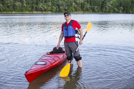 Travel on the river in a kayak on a sunny day.の写真素材