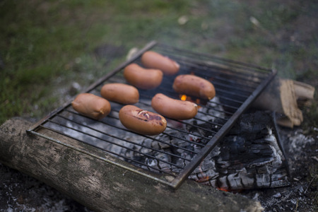 Delicious german sausages on the barbecue grill.の写真素材