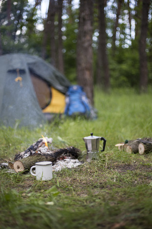 Camping in the woods on the banks of the river.の写真素材