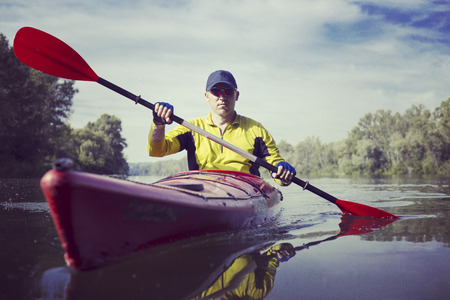 A couple kayaking on Crescent Lake in Park, USAの写真素材