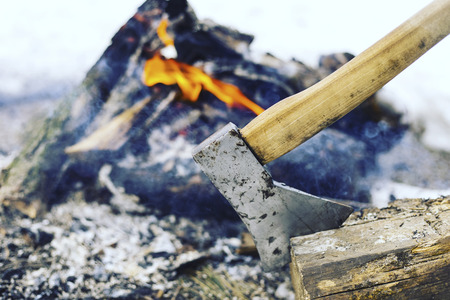 Cooking breakfast on a fire in a tent camp.の写真素材