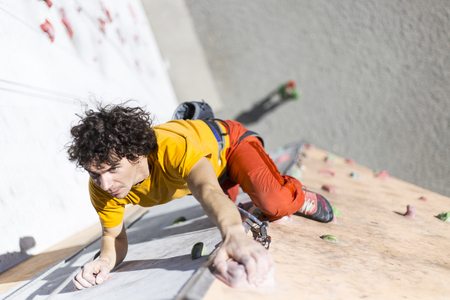 The climber trains on the simulator on the street.の写真素材
