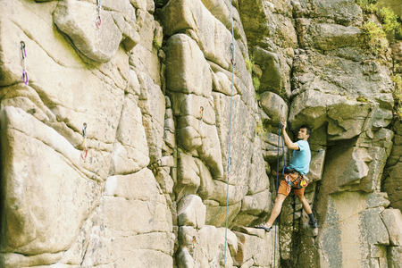 Climber to climb a big wall.Climber to climb a big wall.の写真素材