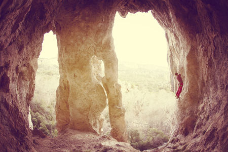 Rock-climbing in Turkey. The climber climbs on the route. Photo from the top.の写真素材