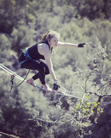 Rock-climbing in Turkey. The climber climbs on the route. Photo from the top.の写真素材
