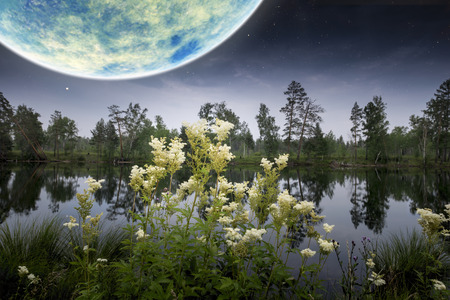 the blue planet in a neighboring galaxy, black spaceの写真素材