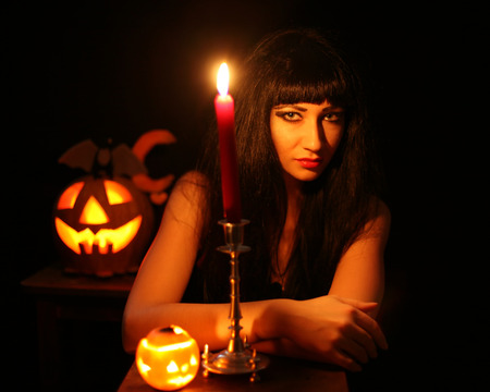 A young woman prepares for Halloween Challengeの写真素材