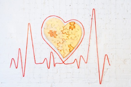 heart beat on a white background with a big heartの写真素材