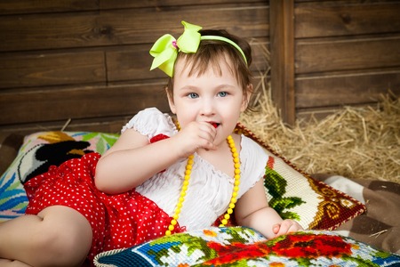 The Girl on the pillows in the hayの写真素材