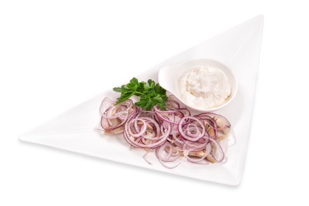 Mushrooms with onion and sour cream isolated on whiteの写真素材