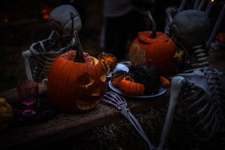 Halloween. Spooky Halloween skeleton with skull and bones in dark background, creepy horror...