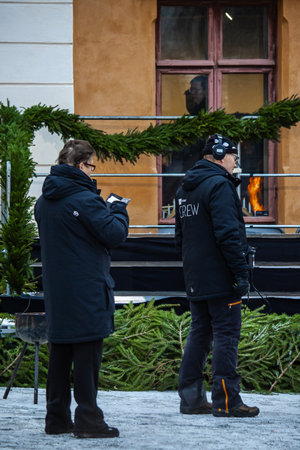 Finland. Turku. December 2025. Photo of television hosts presenting the opening of the Christmas Peace ceremony. The image captures a formal and festive moment with presenters addressing the audience during a traditional holiday celebrationのeditorial素材