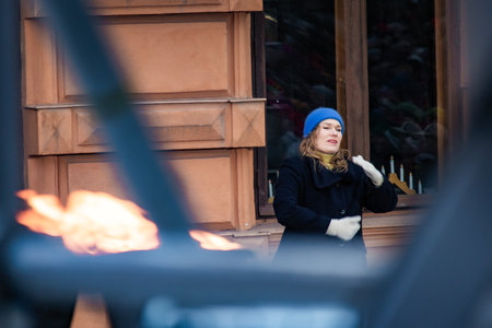 Finland. Turku. December 2025. Photo of television hosts presenting the opening of the Christmas Peace ceremony. The image captures a formal and festive moment with presenters addressing the audience during a traditional holiday celebrationのeditorial素材