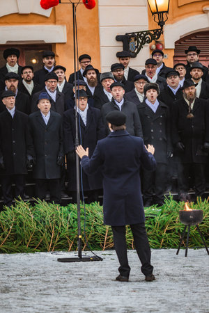 Finland. December 2025. Photo of a conductor directing an orchestra and choir during the Christmas Peace ceremony. The image captures a formal and emotional musical moment representing tradition, harmony, and festive culture, suitable for editorial and cuのeditorial素材
