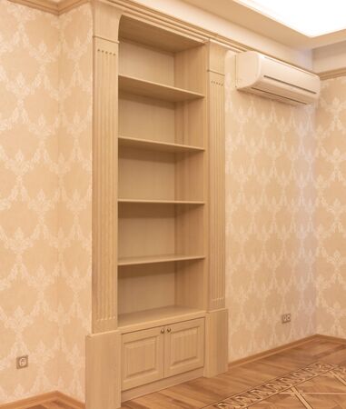 wooden shelves embedded in the wall close-upの写真素材