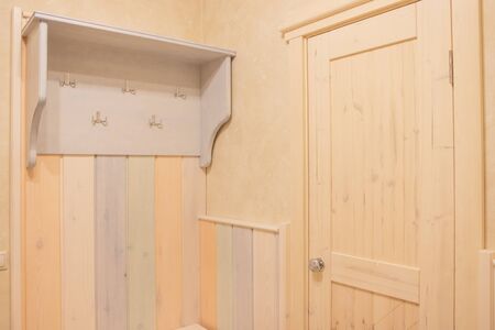 clothes hanger with shelf on topの写真素材