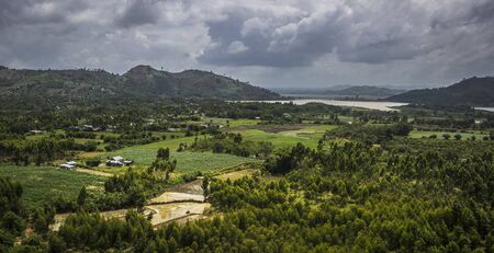 Asia, Vietnam. View from the top of the hill to Rice Fields, Sugarcane